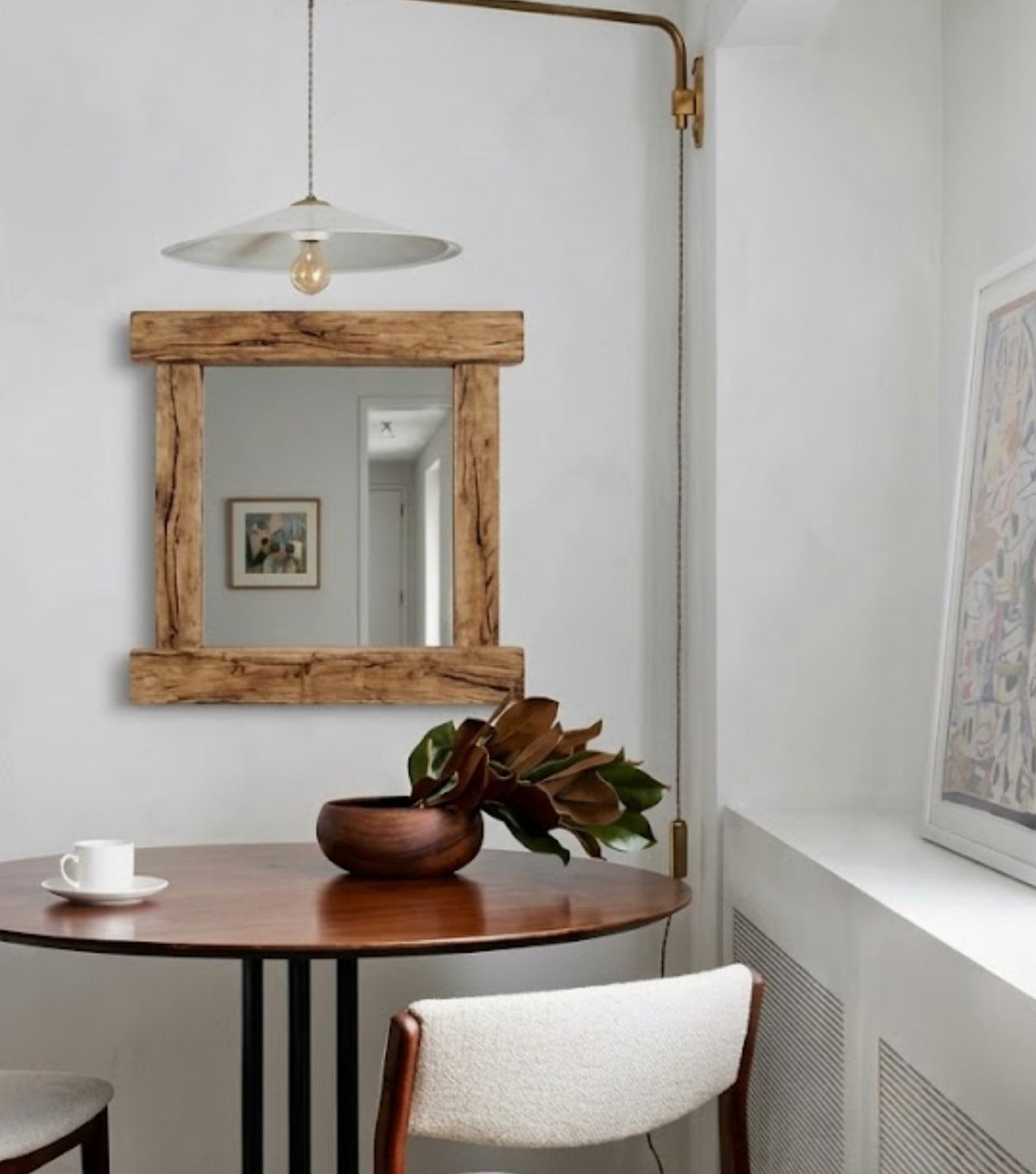 Nova Reclaimed Oak Mirror – above a round dining table with a pendant light