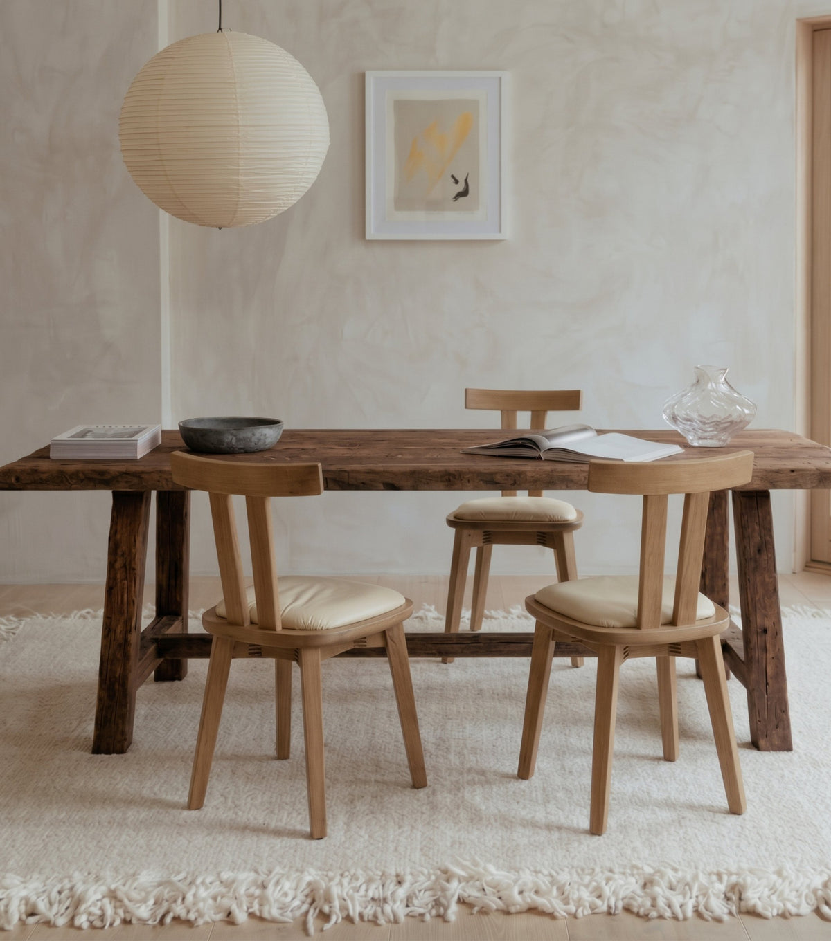 Perlas Reclaimed Oak Dining Table – with oak chairs beneath a paper lantern