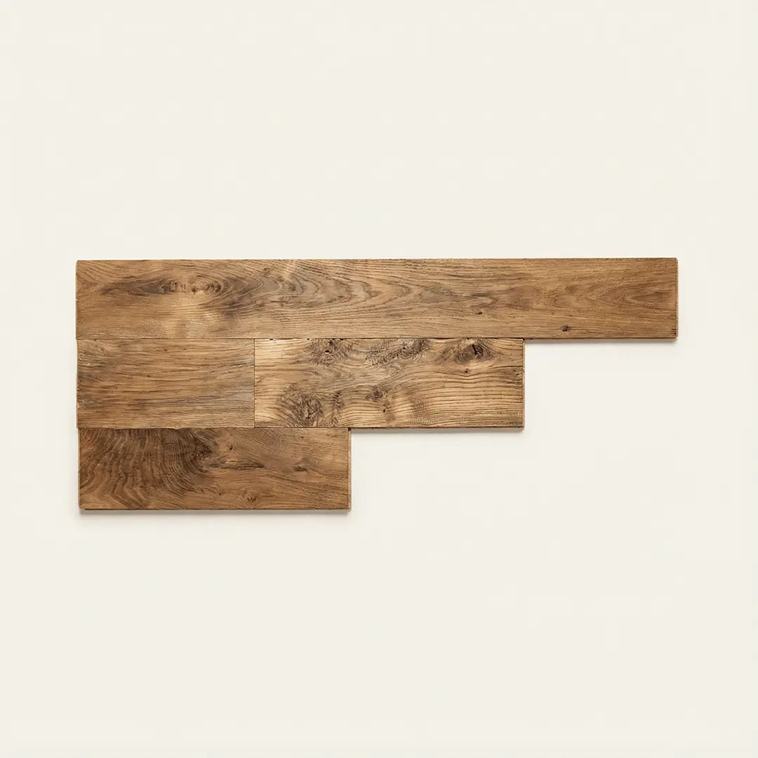 Reclaimed plank flooring in oak with original weathered surface showing natural grain and colour variation