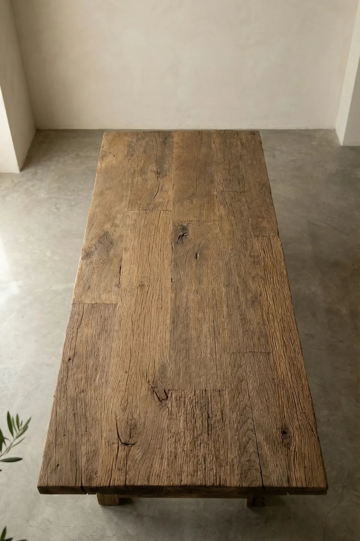 Wooden bench with a rustic finish in a minimalistic setting