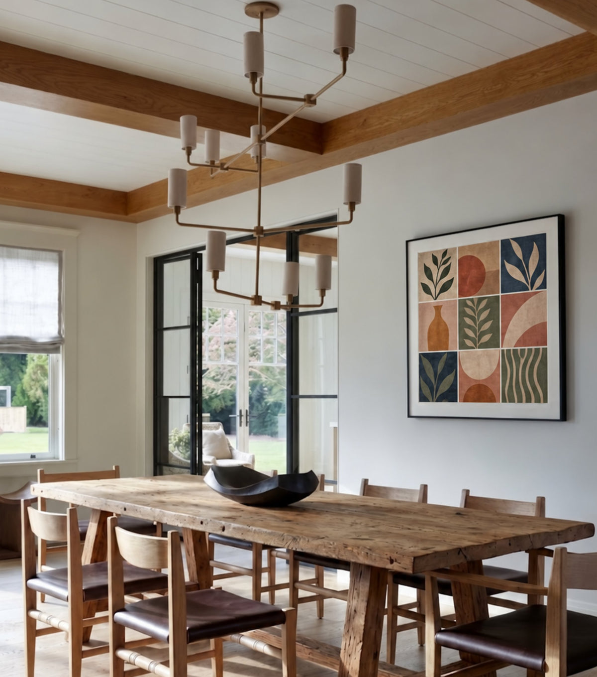 Agora Reclaimed Oak Dining Table – beneath a beamed ceiling with a candle chandelier