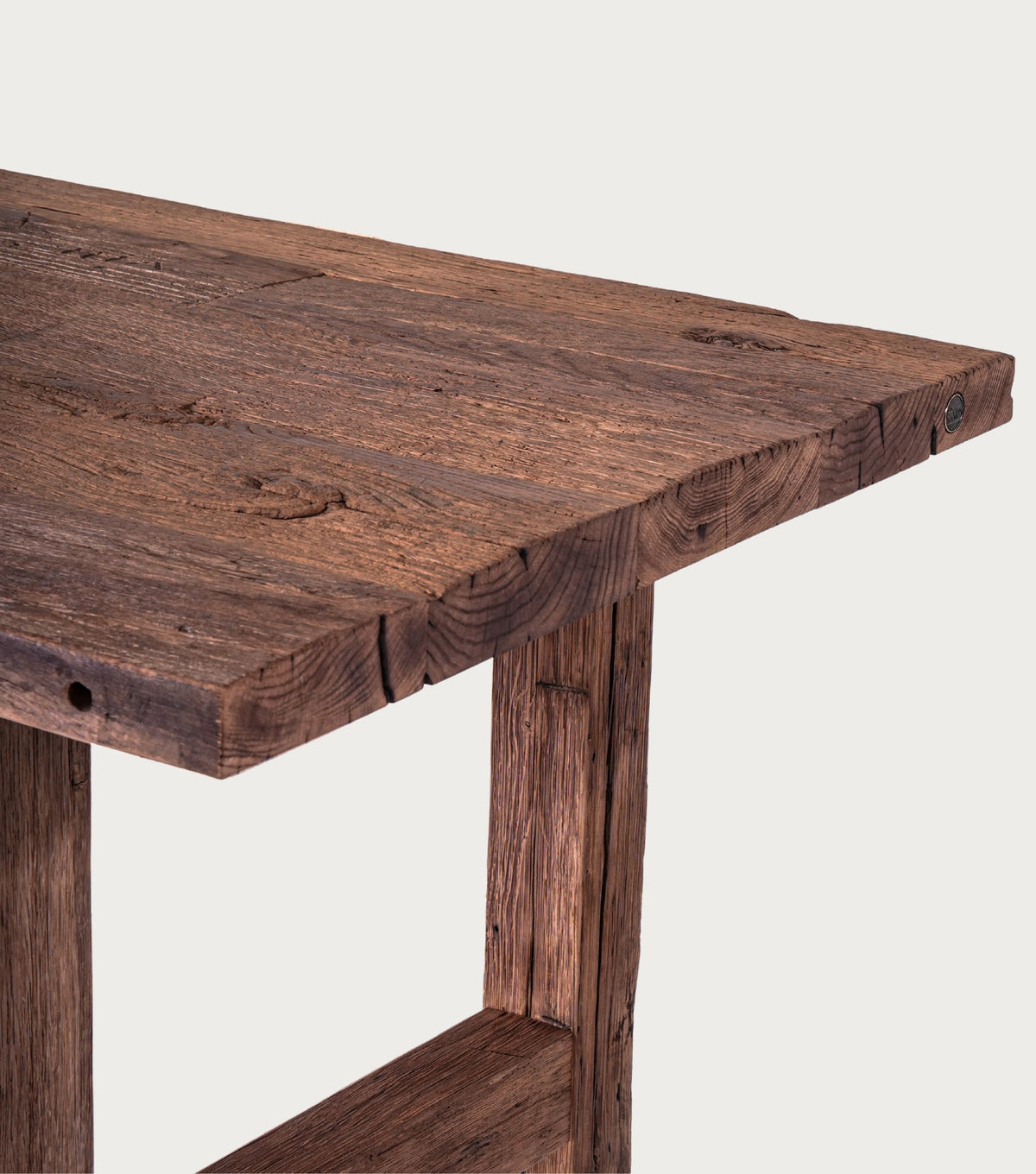 Argolis Reclaimed Oak Dining Table – close-up of the weathered top corner