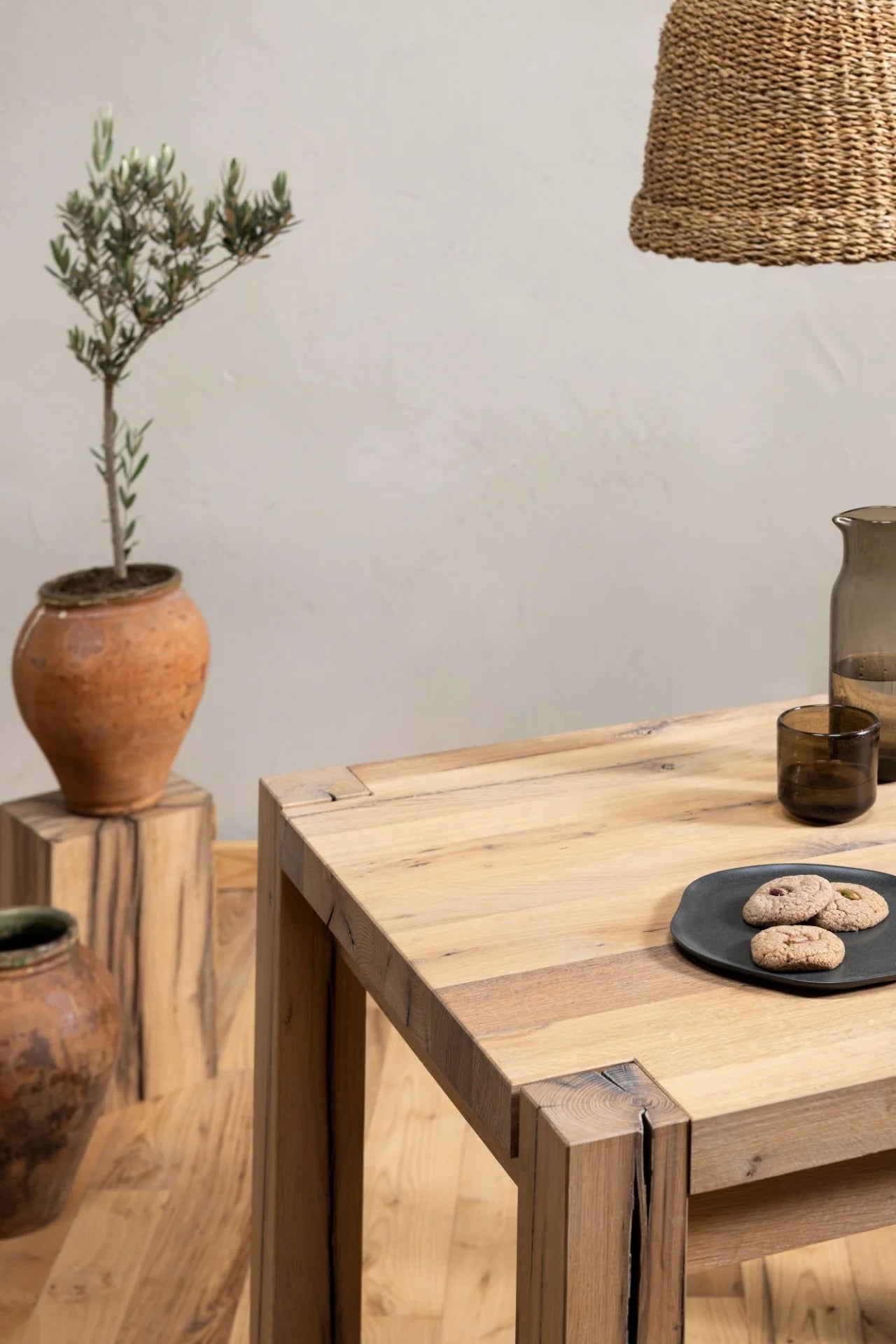 Top-down view of the Driftwood reclaimed wood dining table highlighting natural knots and grain across oak planks