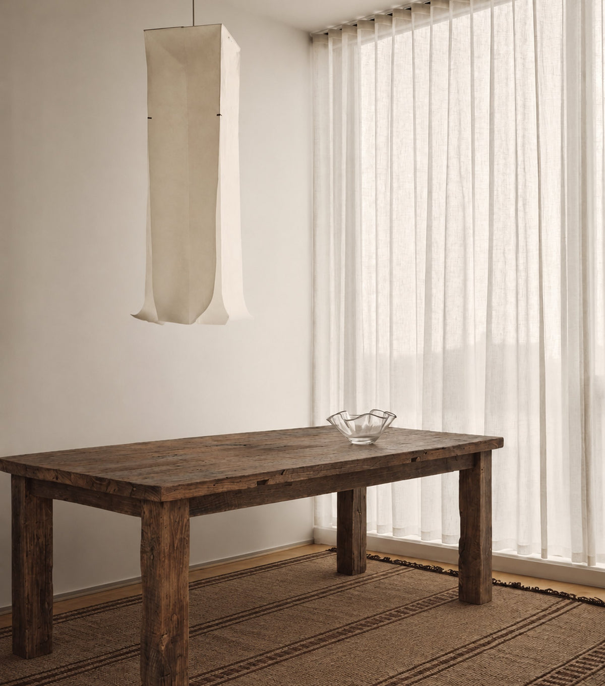 Hespera Reclaimed Oak Dining Table – in a calm dining room with sheer curtains