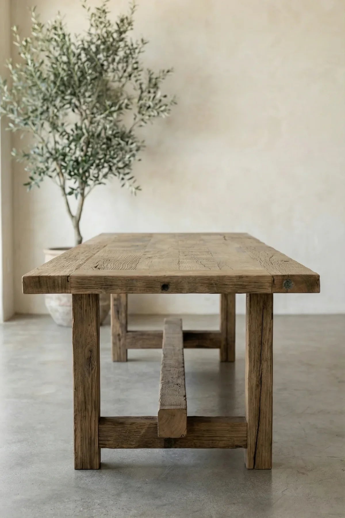 Reclaimed structural oak beam leg of the Matera dining table with natural surface markings