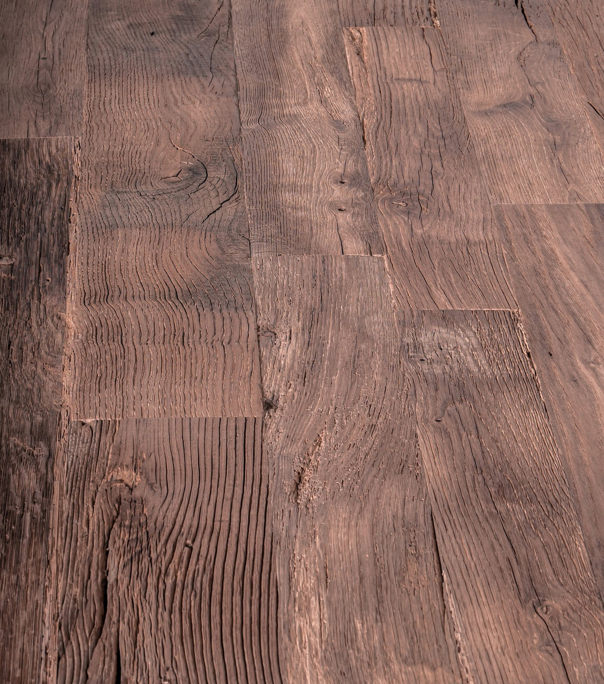Matera Reclaimed Oak Dining Table – close-up of the dark weathered top