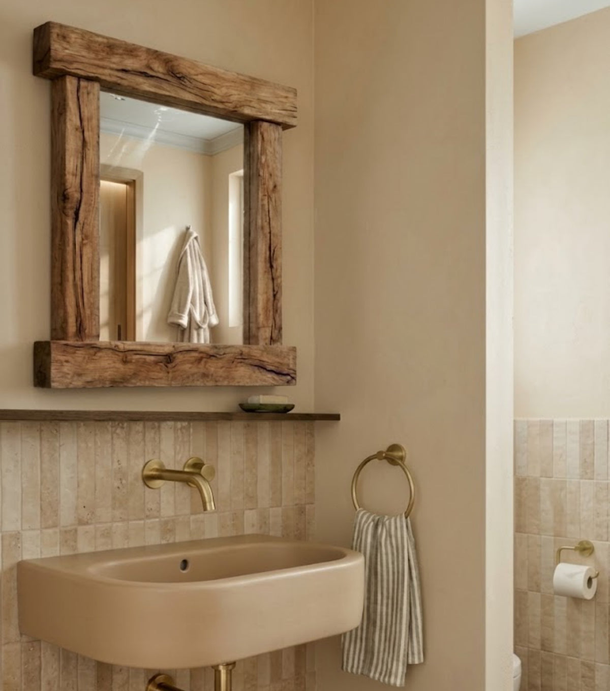 Nova Reclaimed Oak Mirror – above a basin with brass taps