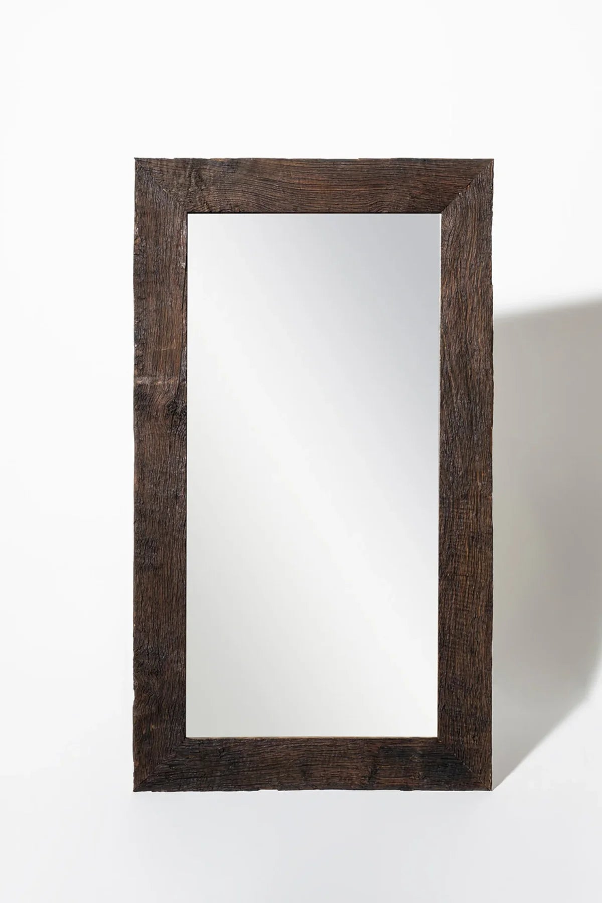Oasis reclaimed oak mirror — three-quarter angle showing frame depth and profile