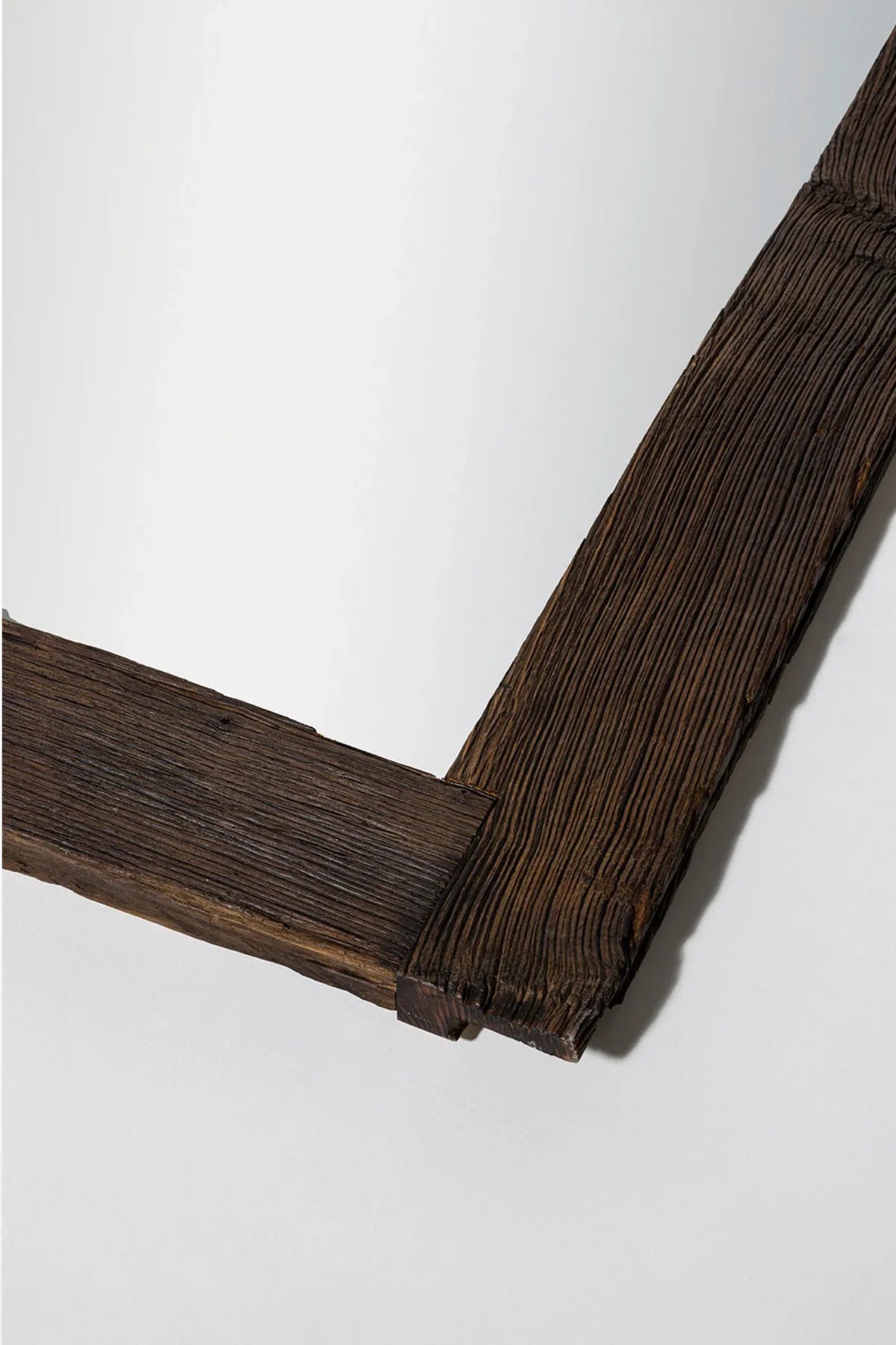 Oasis reclaimed oak mirror — three-quarter angle showing frame depth and profile