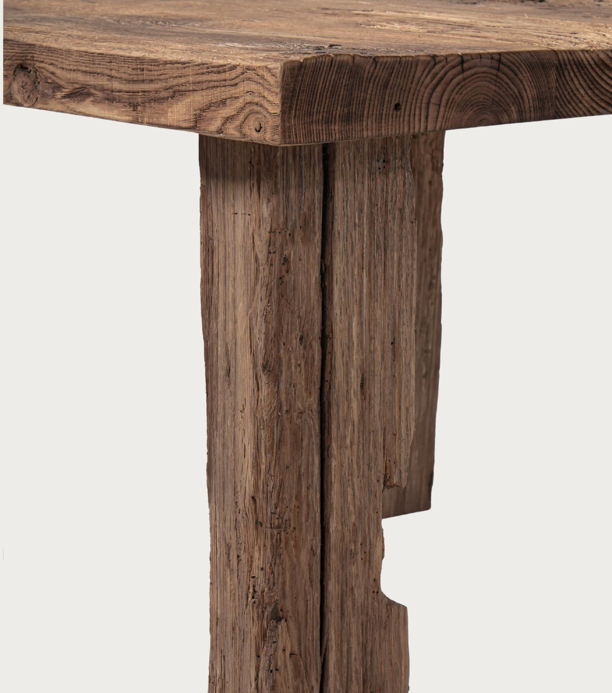 Ostia Reclaimed Oak Coffee Table – detail of a slab leg and the top edge