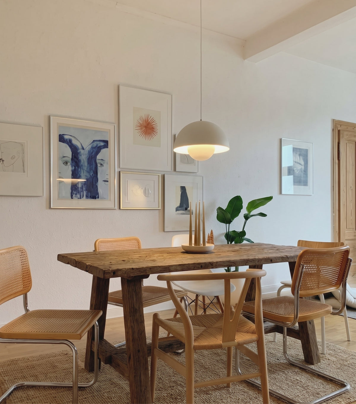Perlas Reclaimed Oak Dining Table – with cane chairs beneath a white pendant