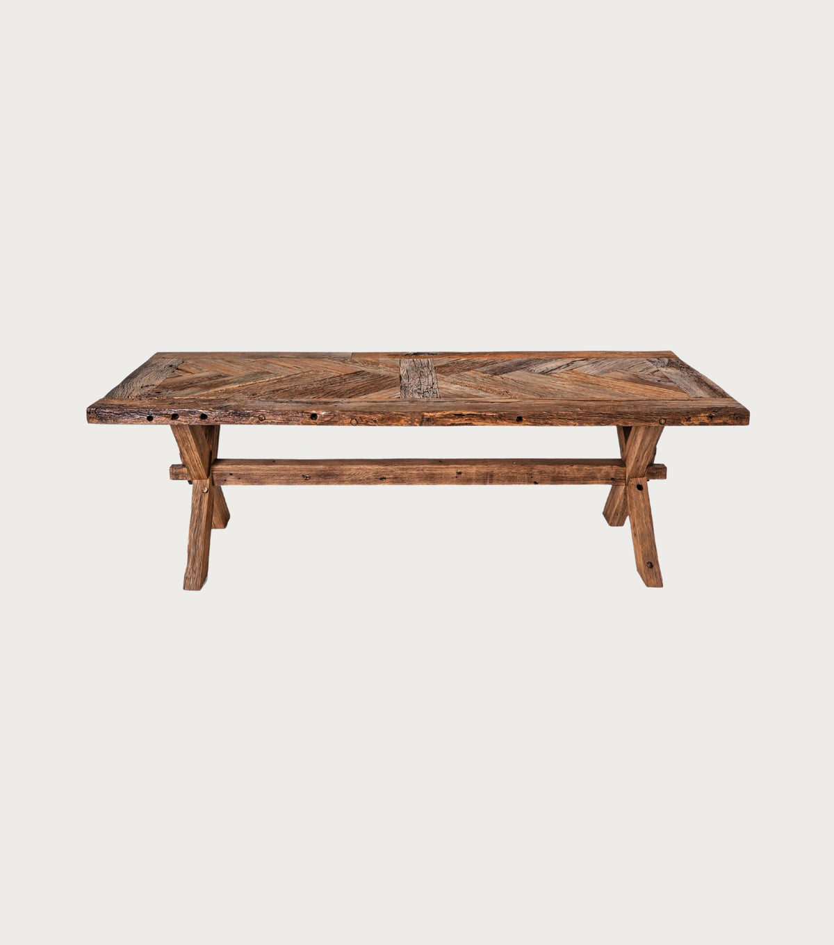 Petra Reclaimed Oak Herringbone Dining Table – front view showing the herringbone top