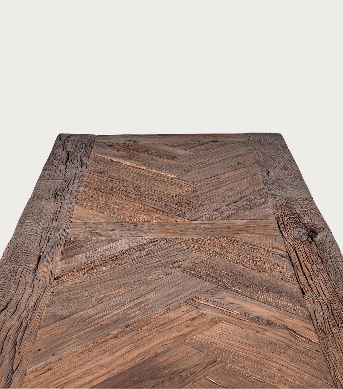 Petra Reclaimed Oak Herringbone Dining Table – close-up of the herringbone pattern