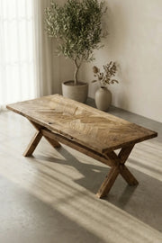 Petra reclaimed oak herringbone dining table styled in a dining room interior