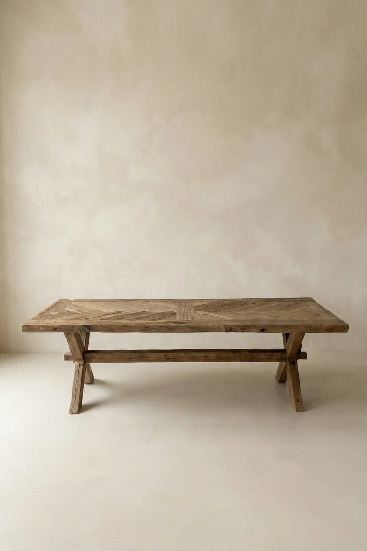 Petra reclaimed oak herringbone dining table styled in a dining room interior