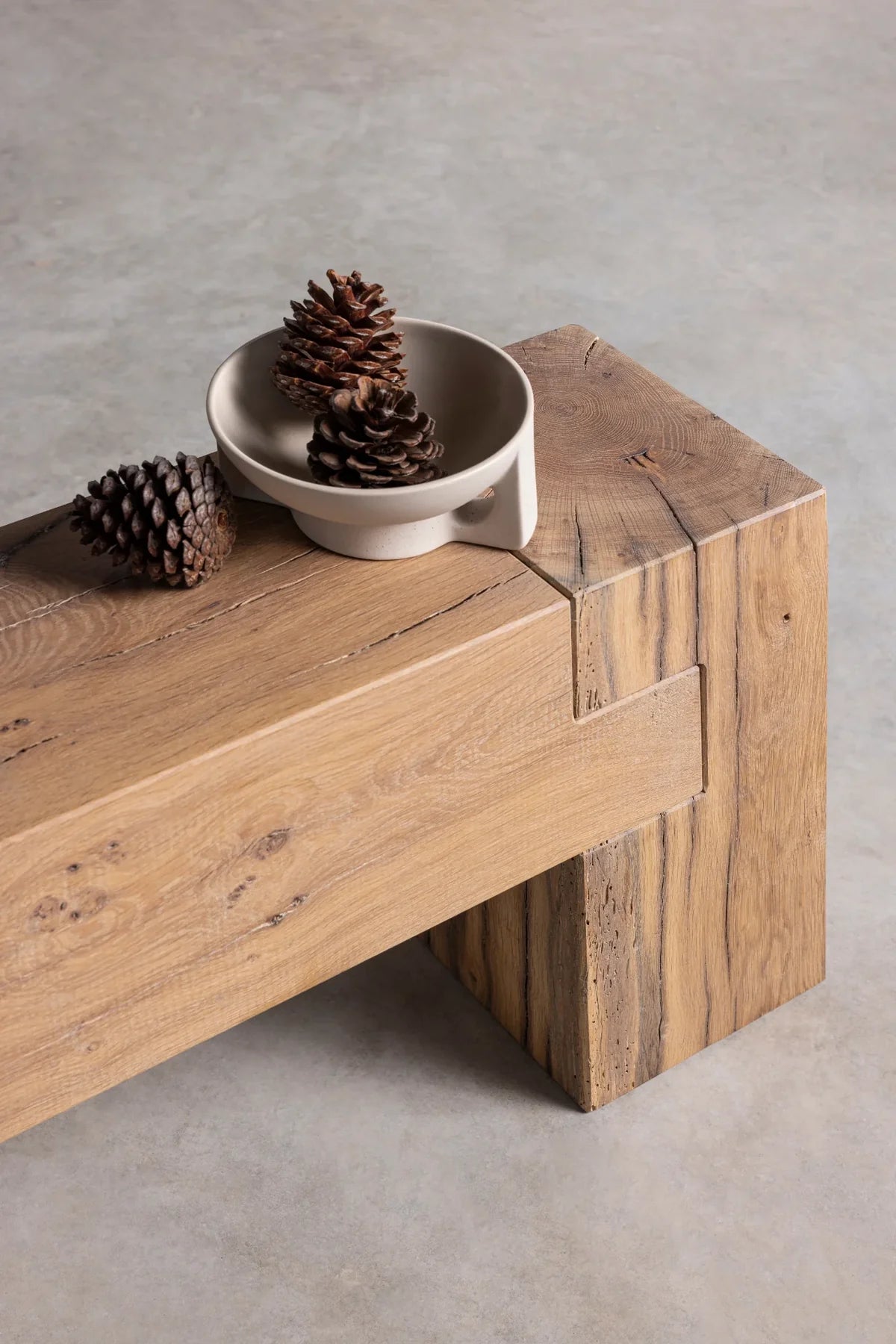 Sable bench used as a dining bench alongside a reclaimed oak dining table