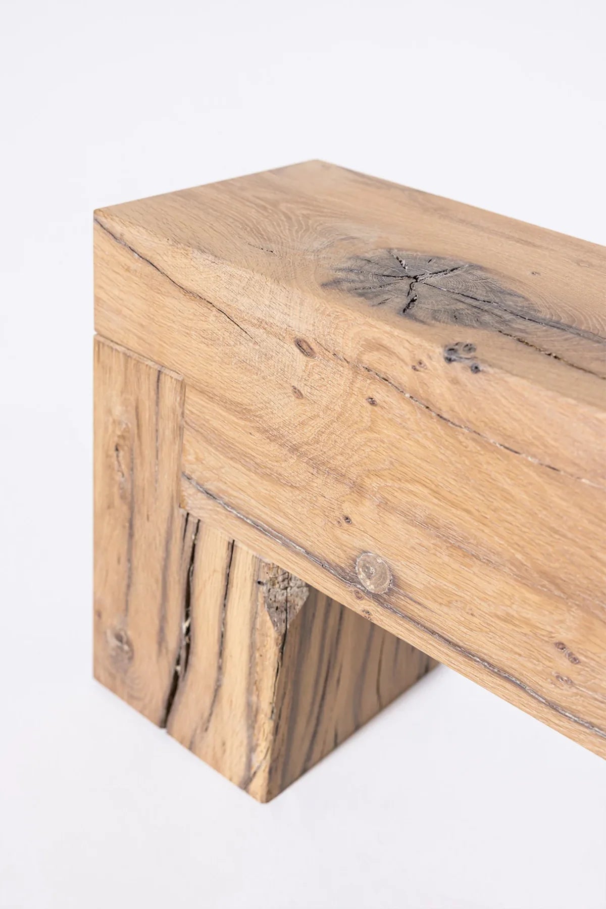 Sable bench in planed surface finish — inner grain exposed, lighter tones