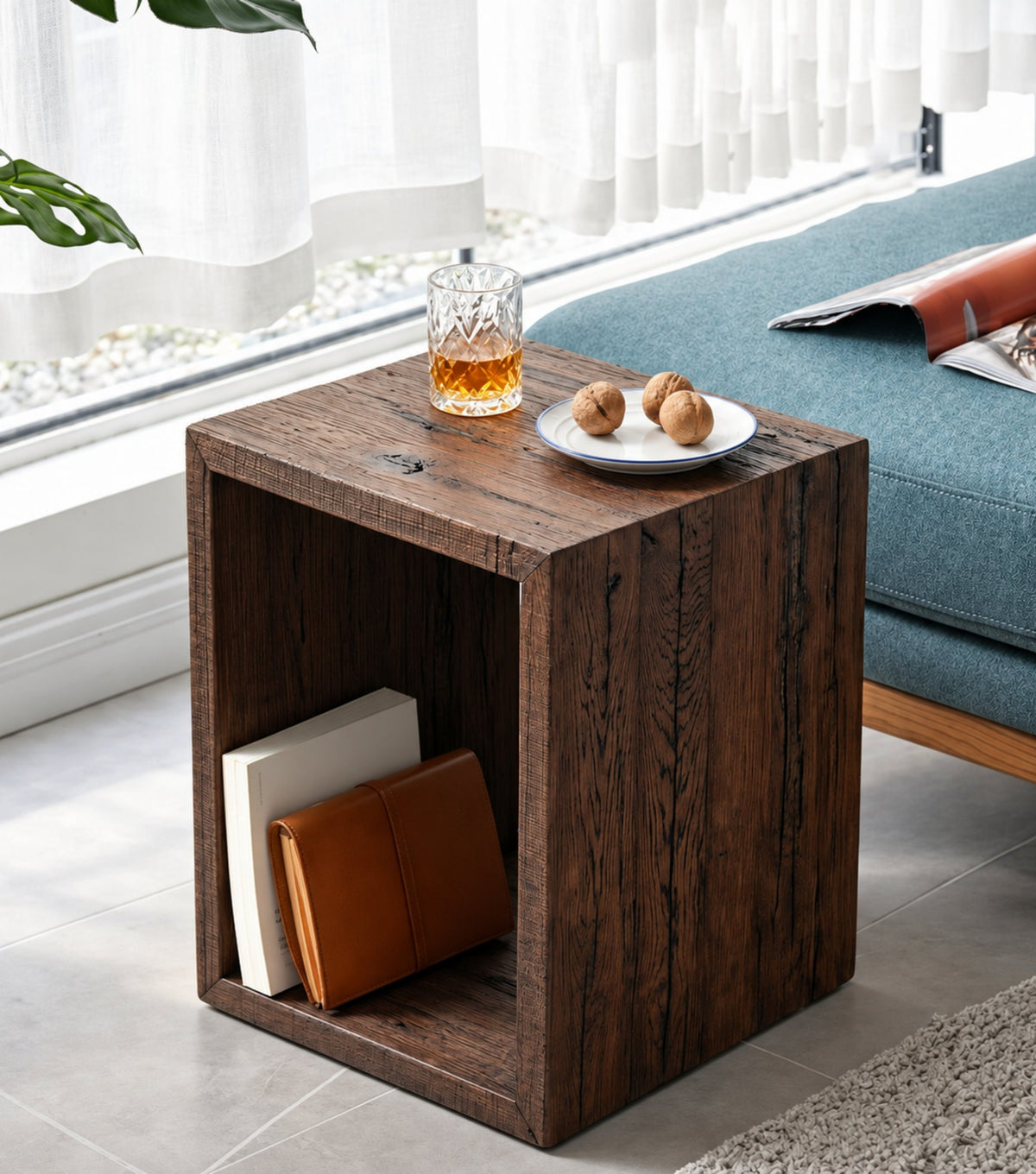 Sardis Reclaimed Oak Side Table – beside a blue daybed by the window