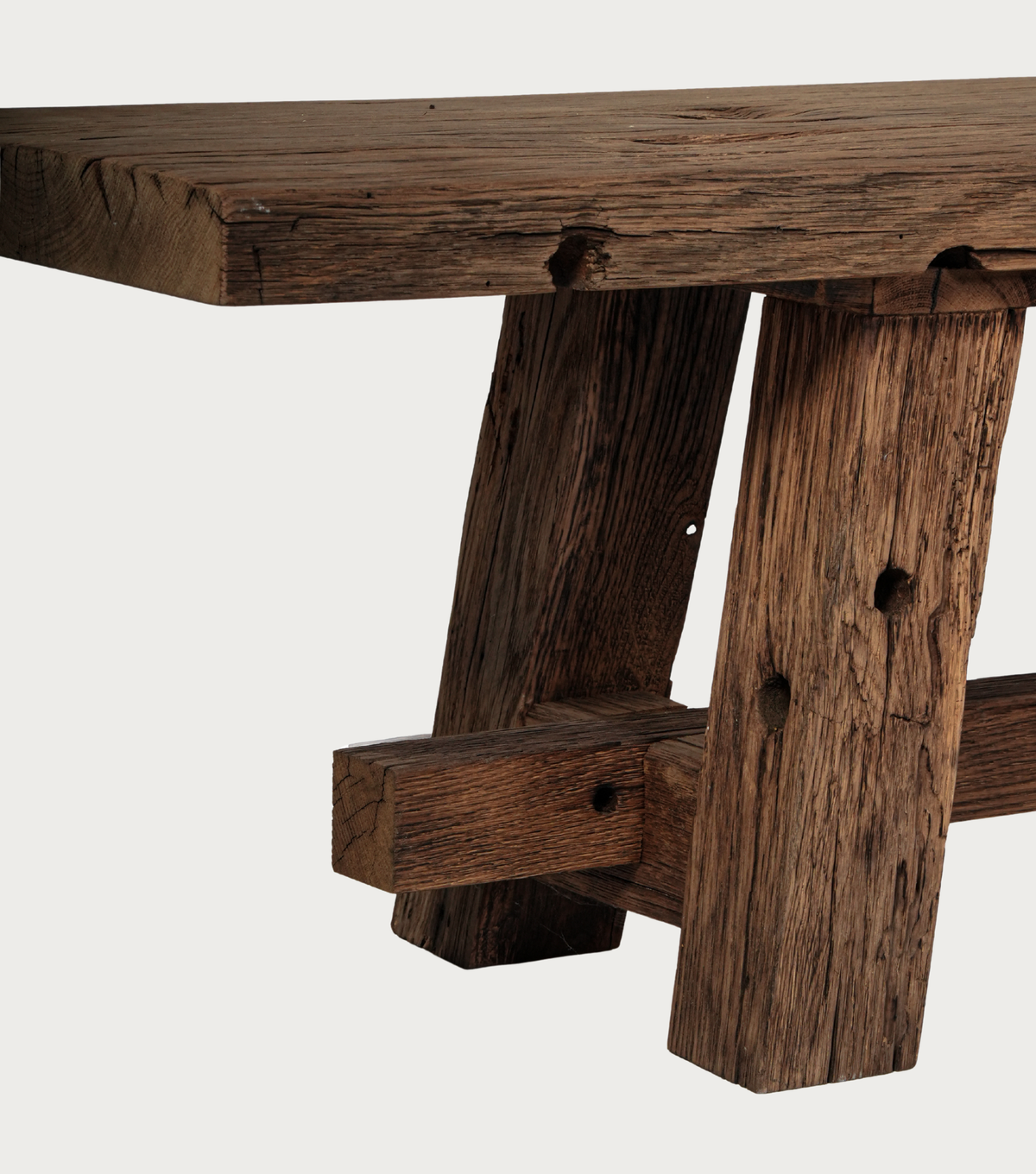 Sedra Reclaimed Oak Bench – detail of the trestle leg and stretcher