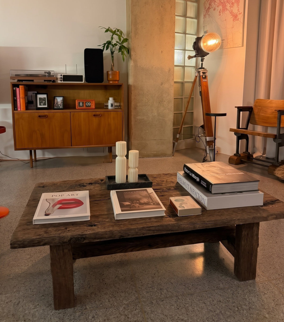 Segesta Reclaimed Oak Coffee Table – styled with books and candles in a mid-century living room