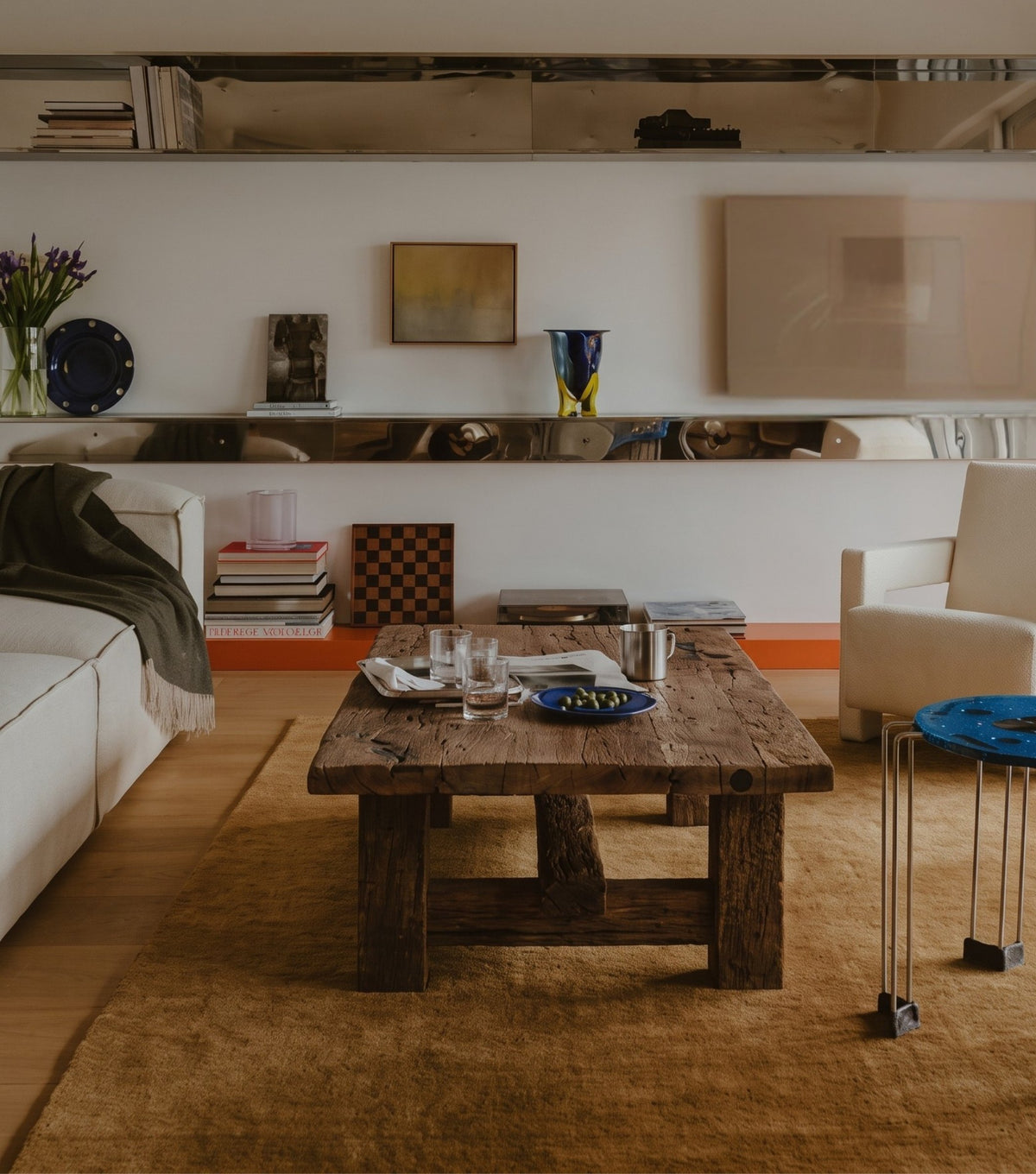 Segesta Reclaimed Oak Coffee Table – in a living room with a white sofa and long shelf