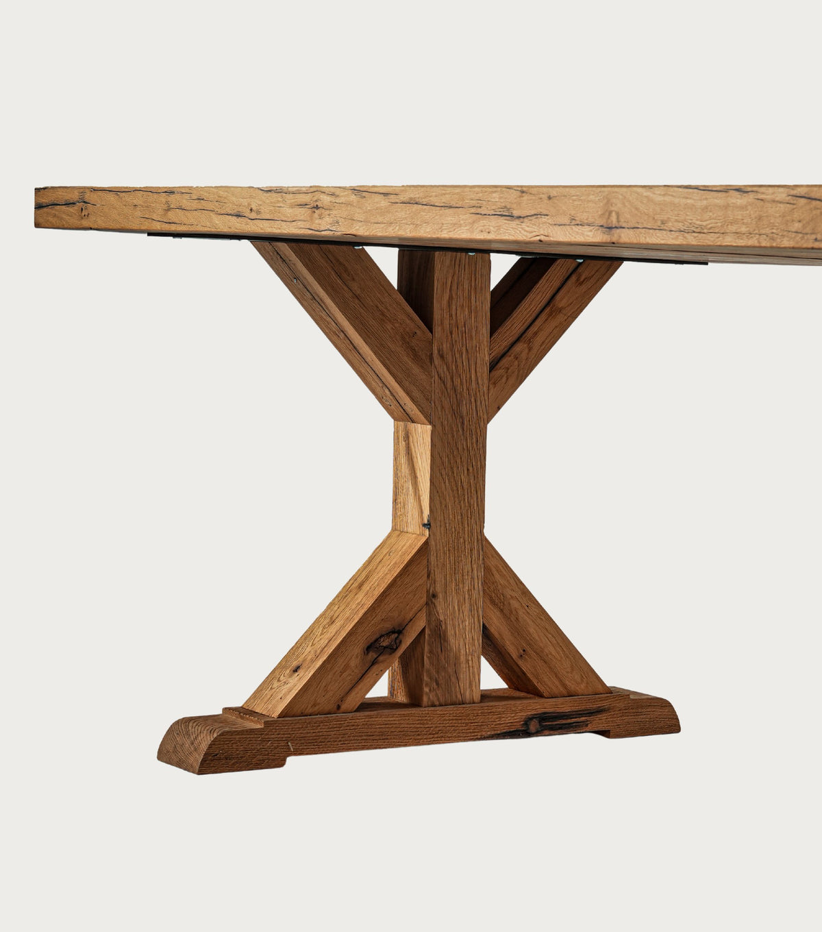 Serra Reclaimed Oak Dining Table – detail of the braced trestle base