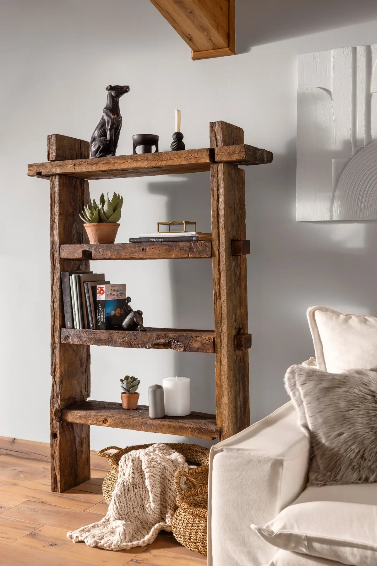 Solstice bookcase in a contemporary interior — reclaimed oak against a neutral background