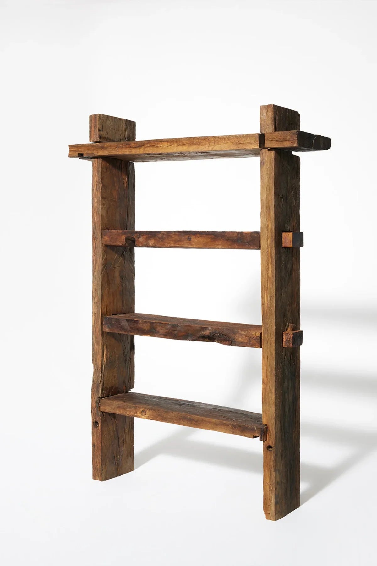 Side profile of the Solstice bookcase showing shelf depth and leg structure