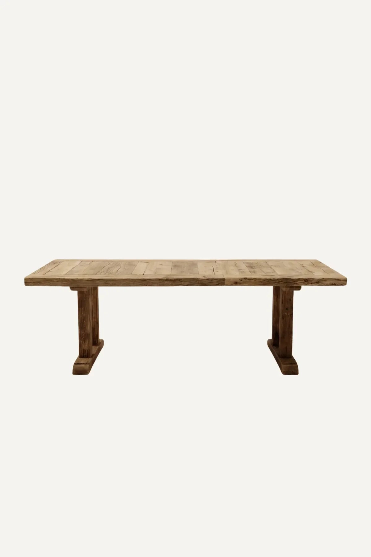 Corner detail of the Stoa dining table showing edge finish and plank construction