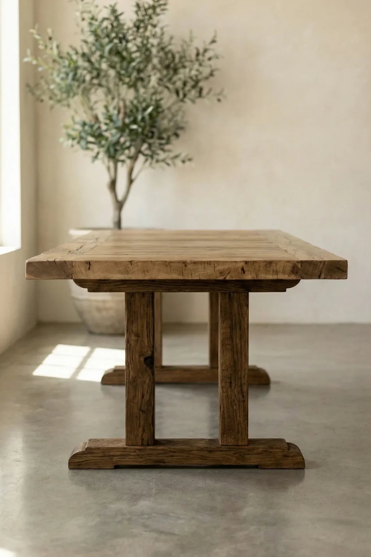 Side profile of the Stoa dining table showing apron and leg joinery