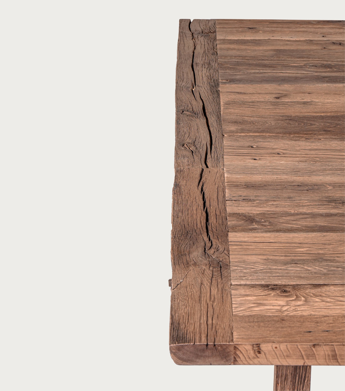 Stoa Reclaimed Oak Dining Table – close-up of the plank top and breadboard end