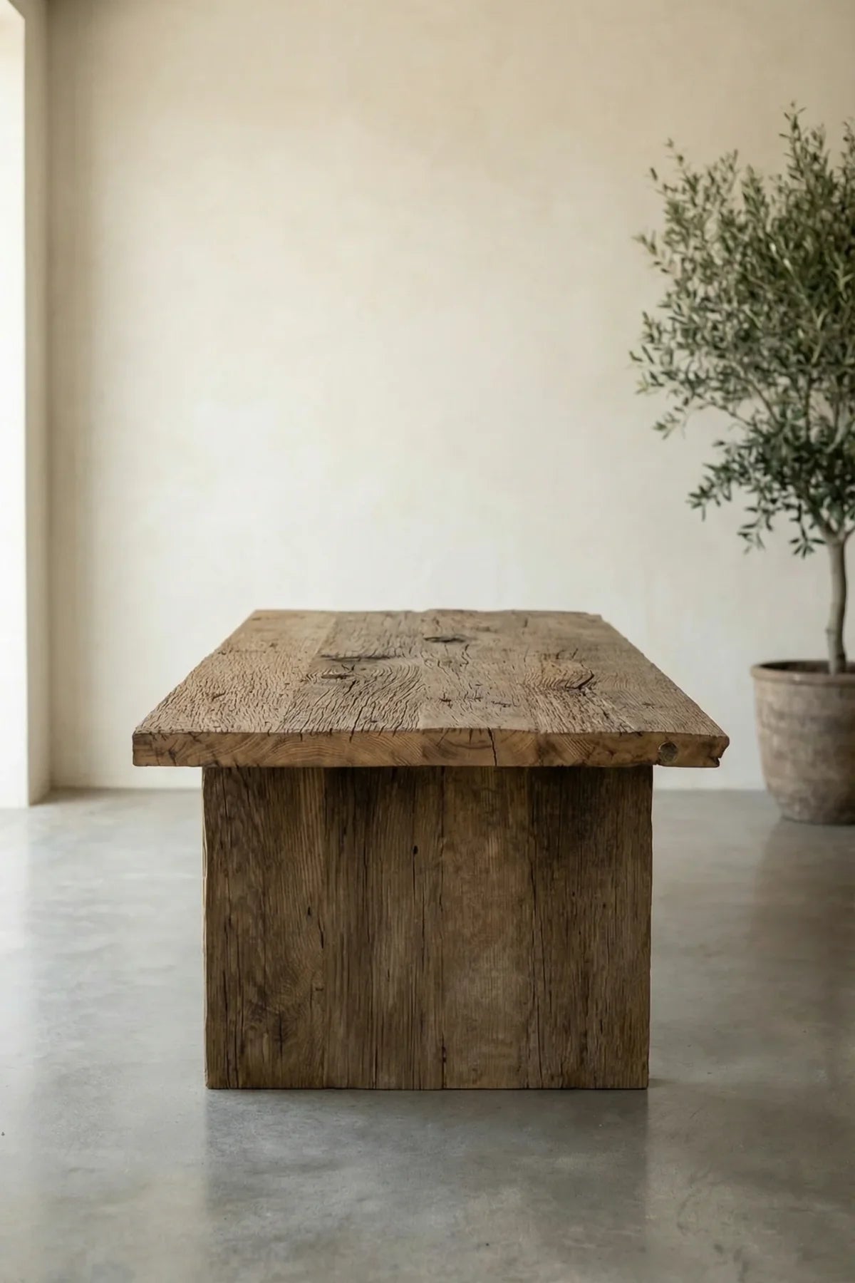 Corner detail of the Thebes dining table showing edge finish and plank joins