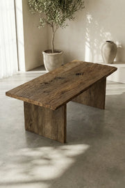Natural knot and filled crack detail on the Thebes reclaimed oak dining table surface