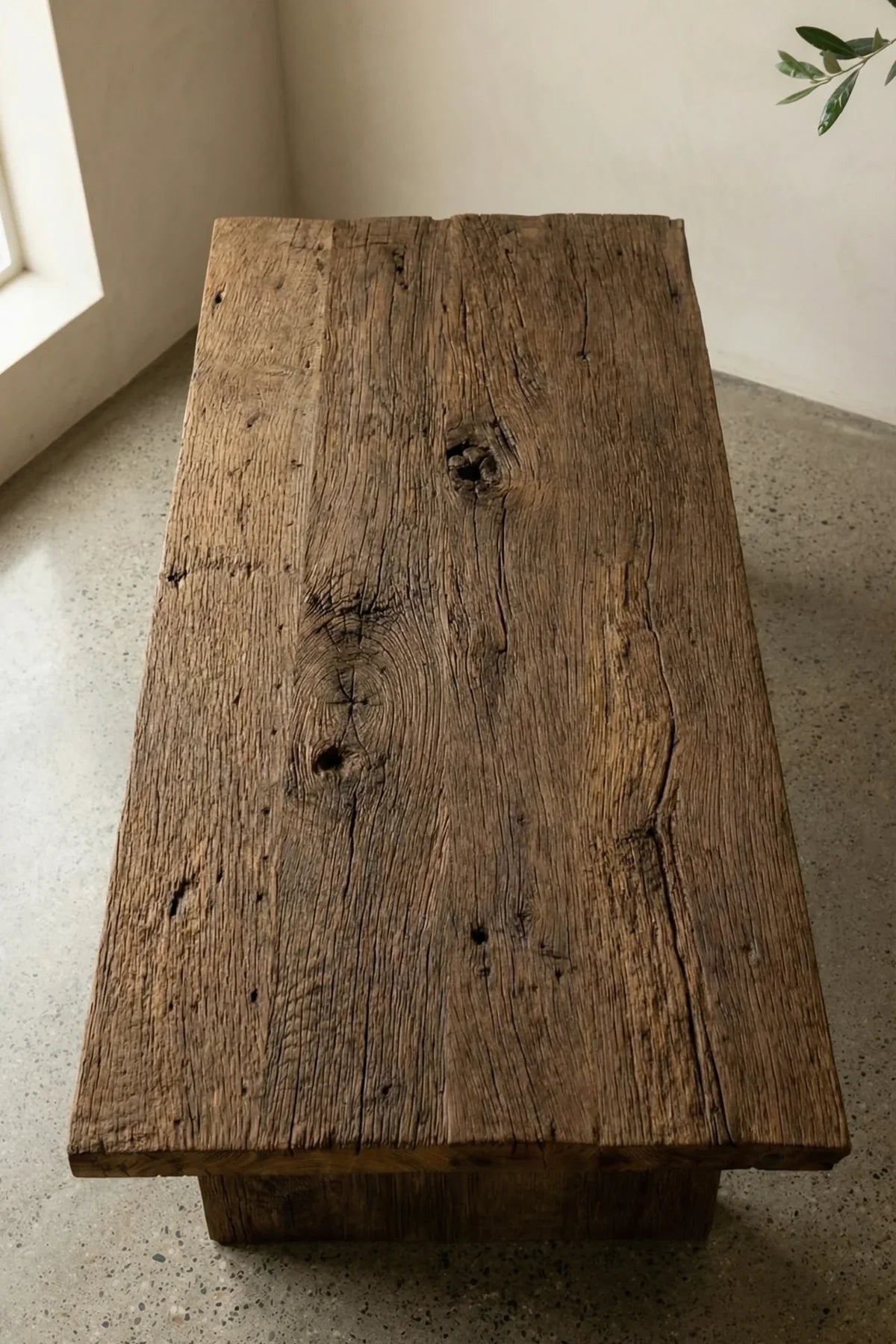Top-down view of the Thebes dining table showing lightly brushed plank surface construction