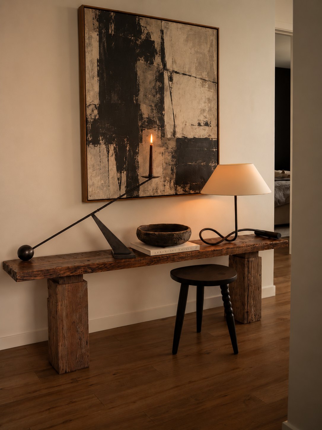 Trabes Reclaimed Oak Console Table – in a hallway with a lamp and abstract artwork